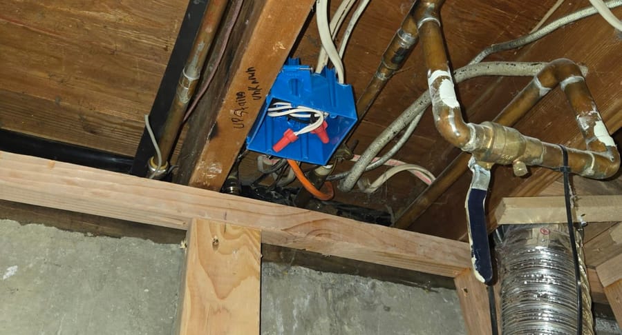 Electrical junction box in ceiling.