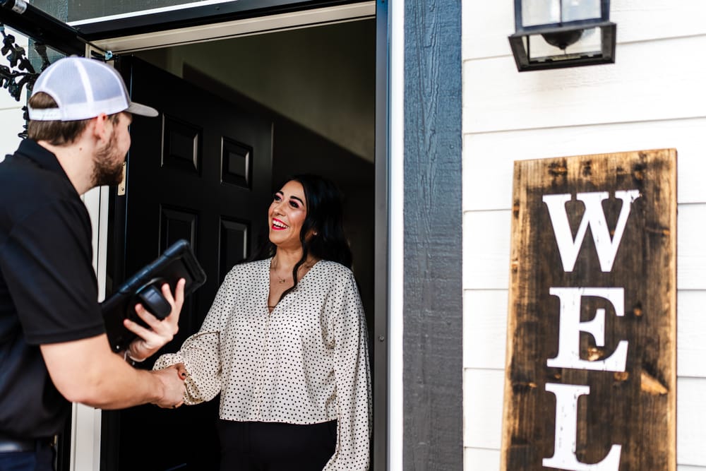 A Heart HCPE Group technician greeting client before appointment.