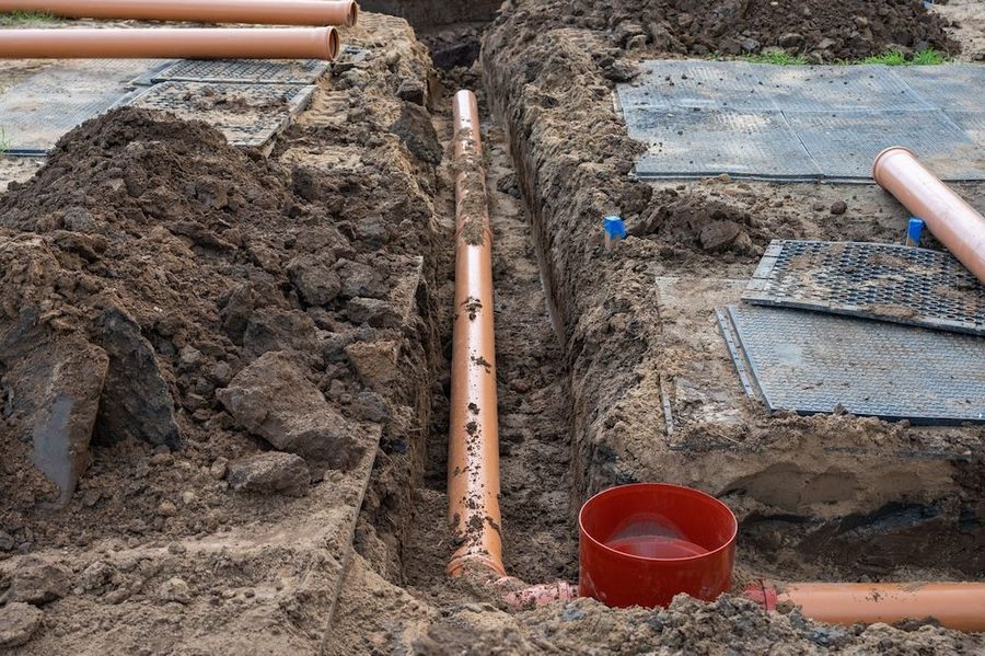 Underground sewer pipes being repaired and worked on